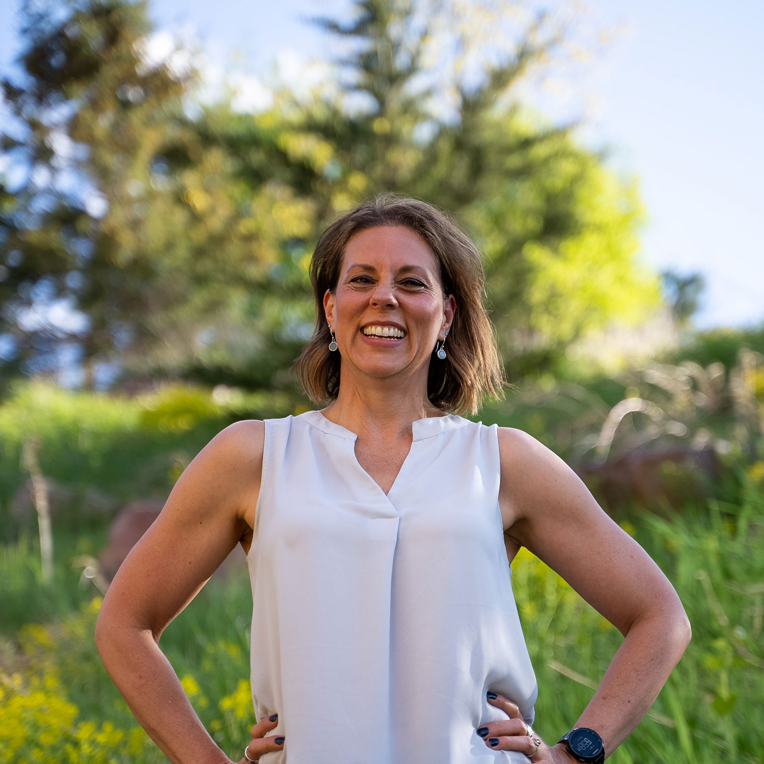 DarcyOutdoors Darcy, author of Thoughtfully Fit, smiling outdoors