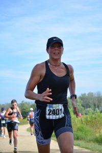 Darcy Luoma running in a triathalon