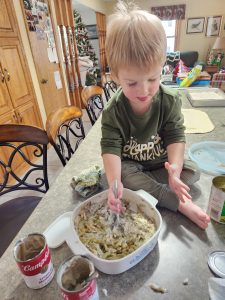 Jill's nephew and green bean casserole sous chef