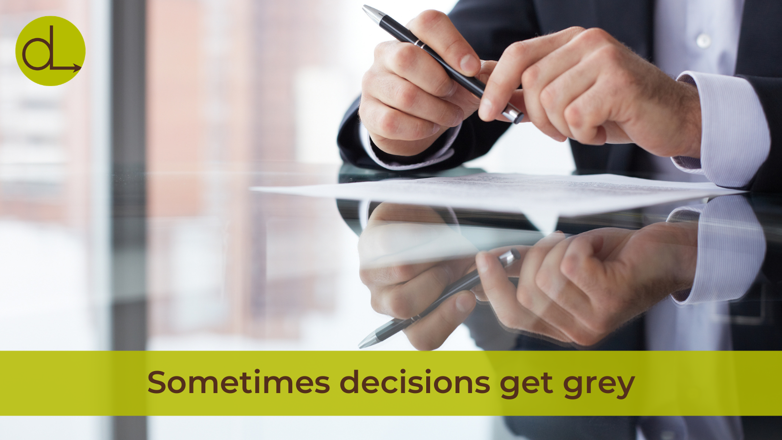 Darcy Luoma Coaching and Consulting — two hands reviewing documents during the decision-making conversation every Visionary-Integrator pair needs to have